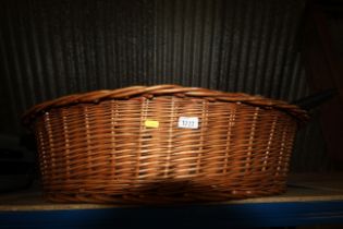 An oval wicker basket