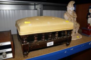 An Edwardian upholstered footstool