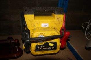 A 900 amp battery jumper with air compressor