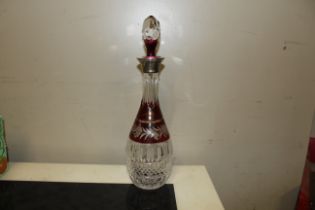 A good quality cut glass ruby flash decanter with