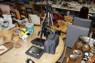 Two portable DVD players, two camera tripods, etc.