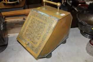 A Victorian brass coal box and integral shovel