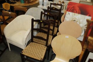 A set of four string seat ladder back dining chair