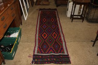 An approx. 9'1" x 2'3" Suzani runner