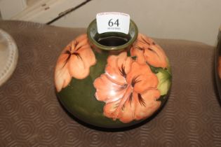 A Moorcroft Pottery "Hibiscus" pattern vase signed W. M. to base