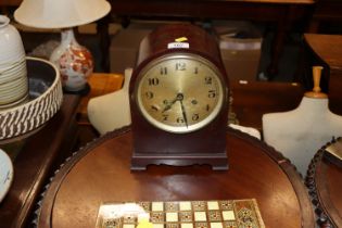 A twin hole mahogany cased mantel clock