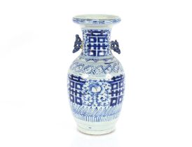 A 19th Century blue and white Chinese baluster vas