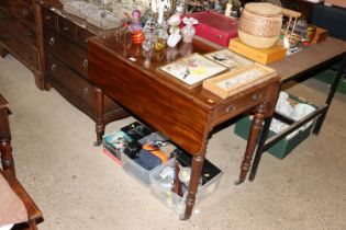 A 19th Century mahogany Pembroke table fitted sing