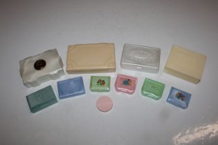 A box of vintage decorated plastic jewellery boxes