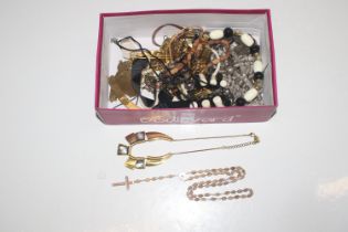A box containing various Eastern style jewellery,
