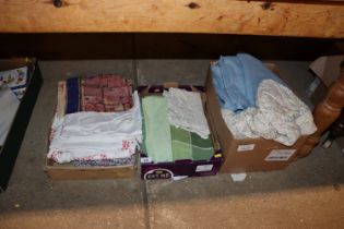 A box of various linens to include patchwork and a