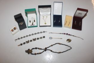A collection of boxed jewellery to include dress r