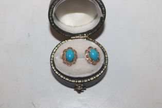 A pair of 9ct gold and turquoise stud ear-rings