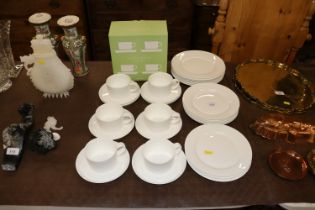 A quantity of John Lewis white bone china teaware;