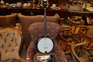 A Martin Smith with Absolute Beginners Banjo Book