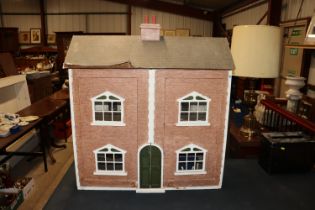 A large doll's house together with three boxes of