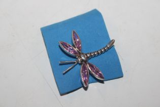 A Sterling silver and pink topaz dragonfly brooch