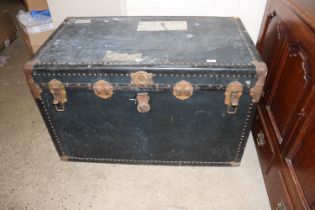 A large metal bound travelling trunk