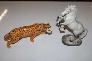 A Beswick model of a cheetah and a Beswick model o