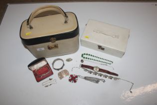 Two jewellery boxes and contents to include coral