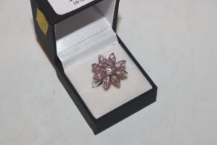 A large Sterling silver and pink topaz flower head