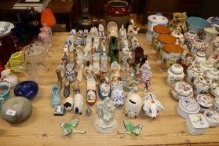 A collection of various cow creamers; porcelain sh