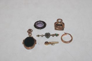 A 9ct gold mounted swivel fob set with bloodstone;
