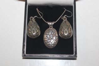 A pair of Sterling silver ear-rings and necklace