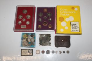 A box containing cased coin sets; various Roman an