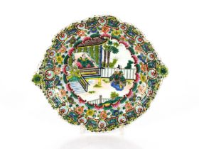 An Oriental famille rose decorated plate having ce