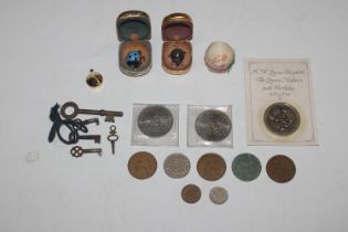 A box containing various coinage; old keys etc.