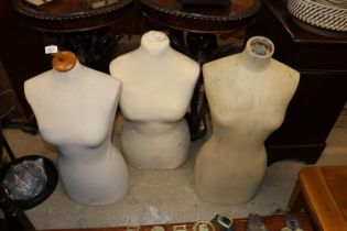 Three female torso mannequins