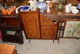 An oak Art Deco fire screen