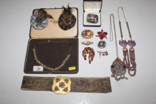 A box of various costume jewellery to include Scot