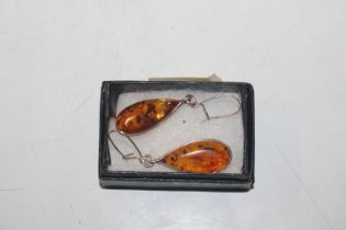 A pair of Sterling silver and amber drop ear-rings