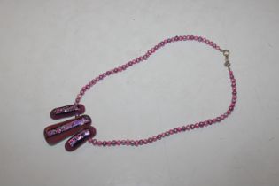 A Dichroic glass and pink pearl necklace