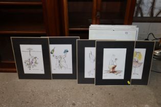 A quantity of photo frames and mounted prints