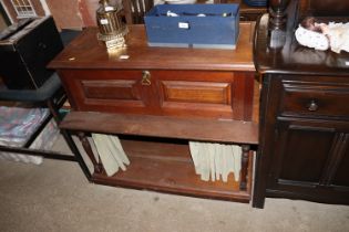 A late Victorian oak side cabinet with drop flap c