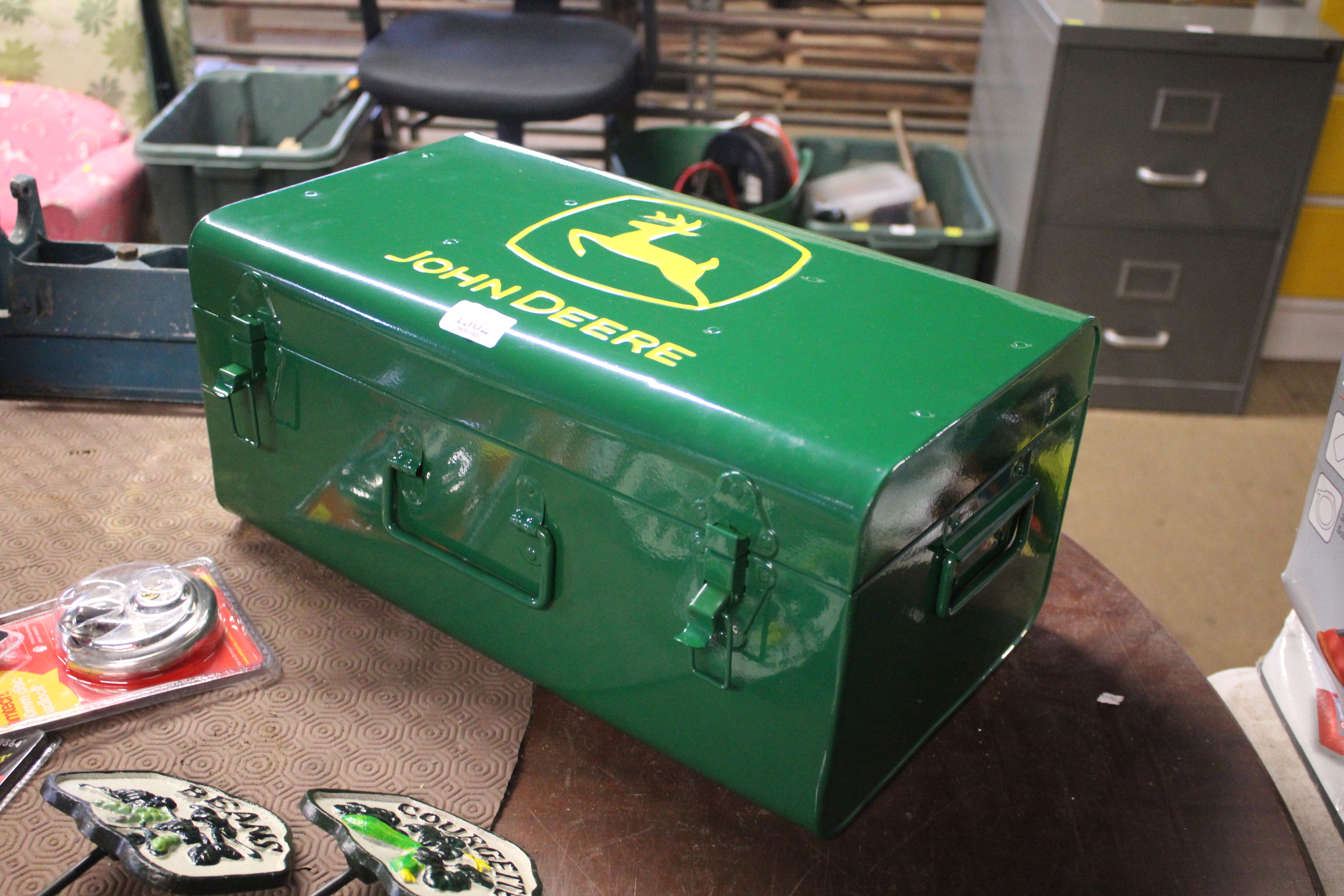 A John Deere style tool box (213)