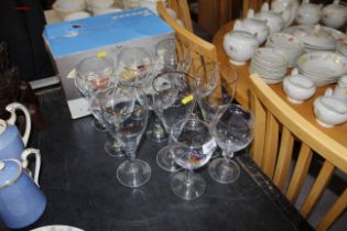 A collection of various Belgium L glasses and gin