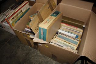 Two boxes of miscellaneous books and DVD's etc.