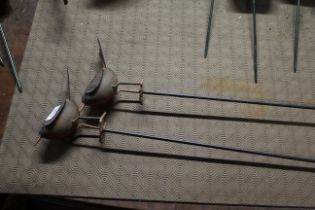 Two metal robin decorations on metal stakes (111/1