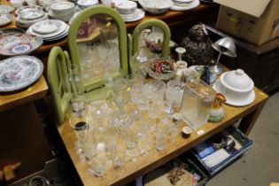 A quantity of various table glassware; a green pai