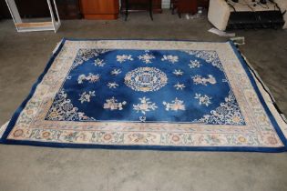 An approx. 10'8" x 8' Chinese wood rug