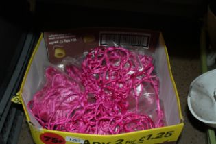 Approx. twenty eight pink coloured basketball nets