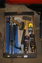 A tile cutter; two club hammers and a quantity of