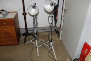 A pair of vintage industrial spotlights