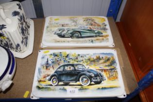 Two enamel signs depicting a Volkswagen beetle and