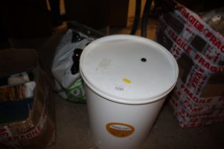 A fermentation bucket and a quantity of plastic be