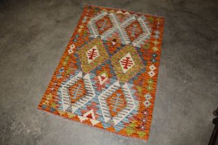 An approx. 4'2" x 2'9" Chobi Kelim rug